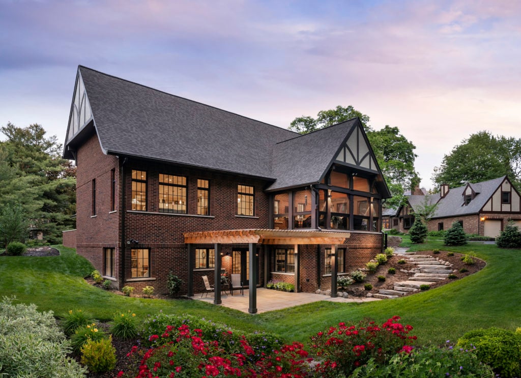 backyard with porch and greenery