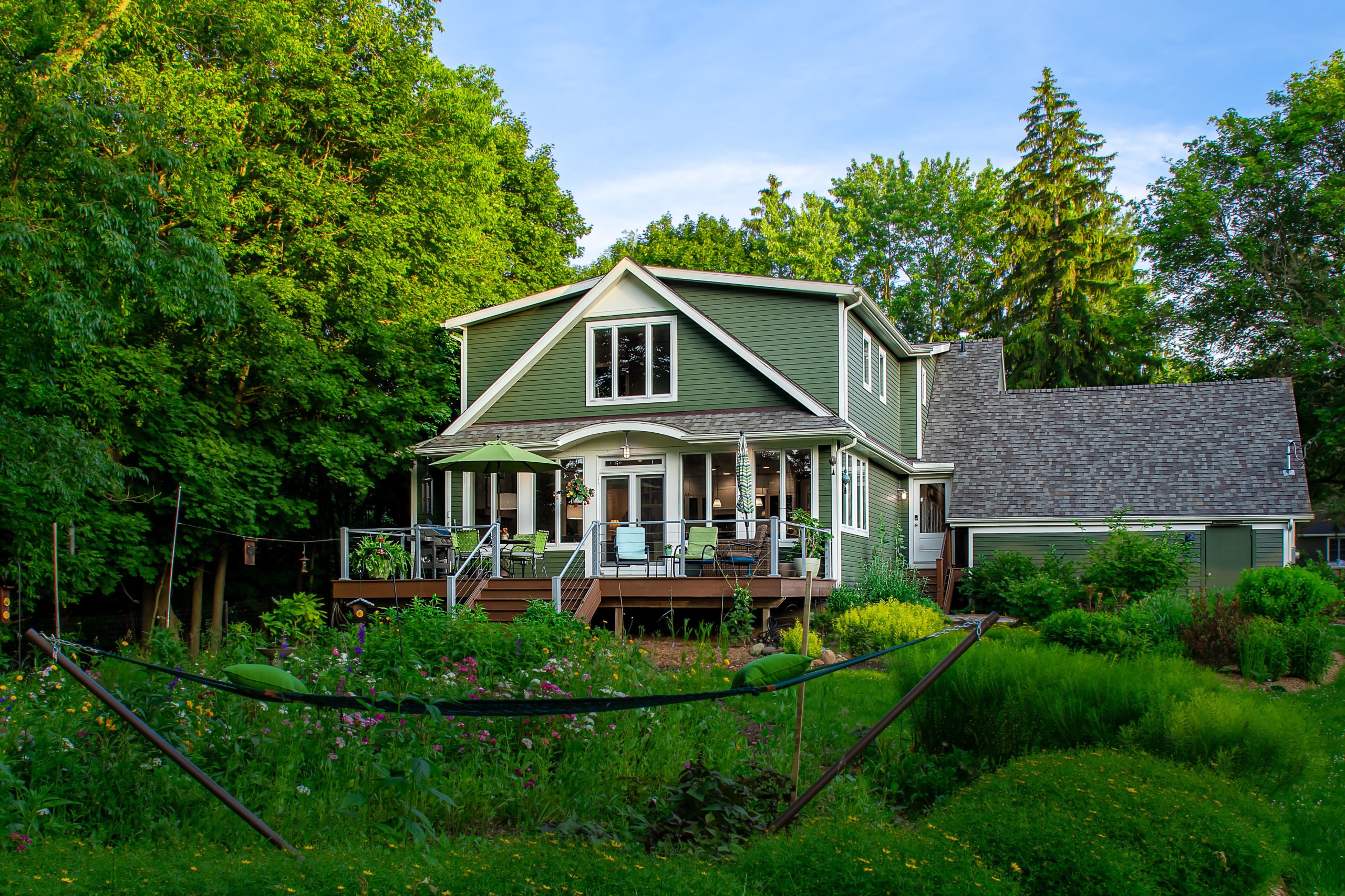 Exterior photo of two story addition by Meadowlark Design+Build